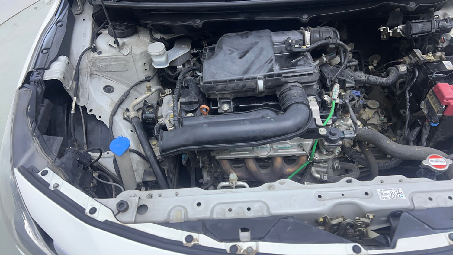 Used 2022 Maruti Suzuki Baleno Delta Petrol Manual engine ENGINE RIGHT SIDE VIEW