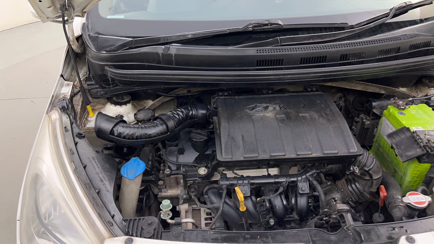 Used 2013 Hyundai Grand i10 Asta AT 1.2 Kappa VTVT Petrol Automatic engine ENGINE RIGHT SIDE HINGE & APRON VIEW