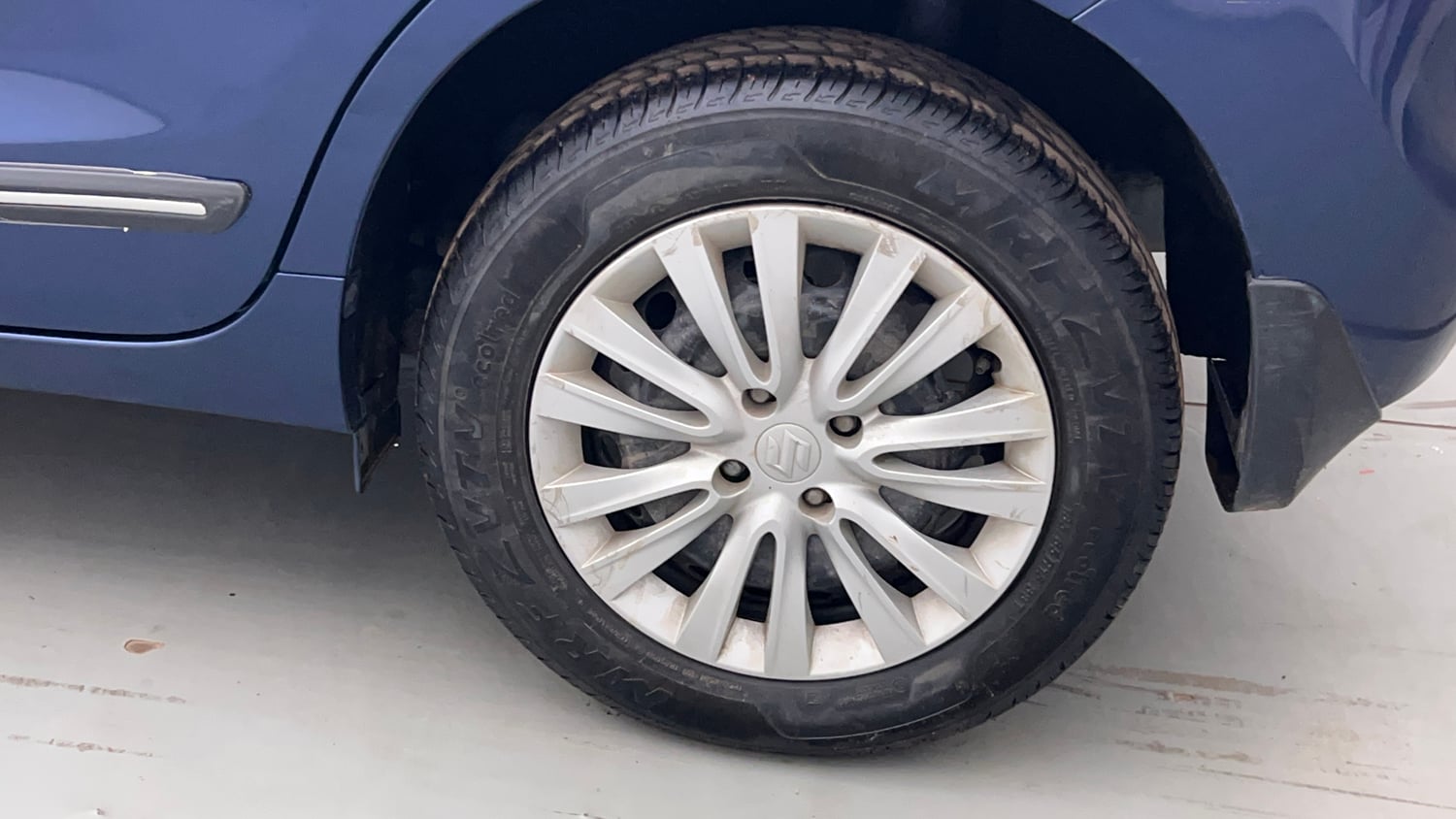 Used 2021 Maruti Suzuki Baleno Delta Petrol Manual tyres LEFT REAR TYRE RIM VIEW