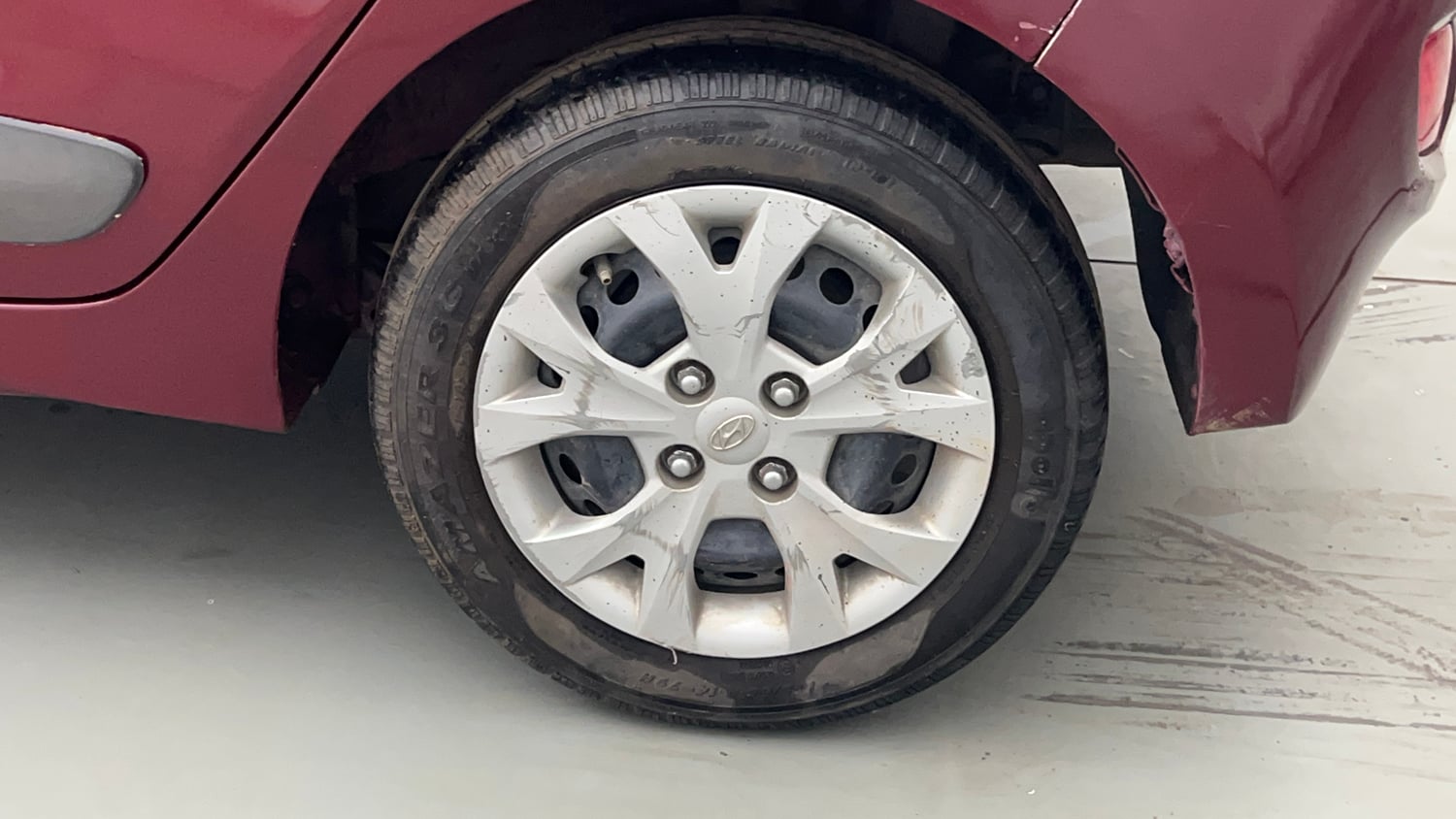 Used 2014 Hyundai Grand i10 Sportz 1.2 Kappa VTVT Petrol Manual tyres LEFT REAR TYRE RIM VIEW