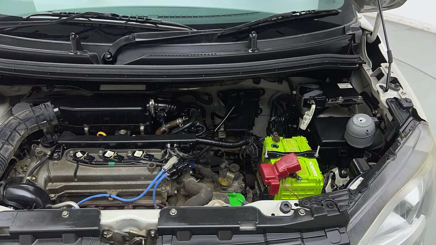 Used 2022 Maruti Suzuki Wagon R 1.0 LXi (O) 1.0 Petrol Manual engine ENGINE LEFT SIDE VIEW
