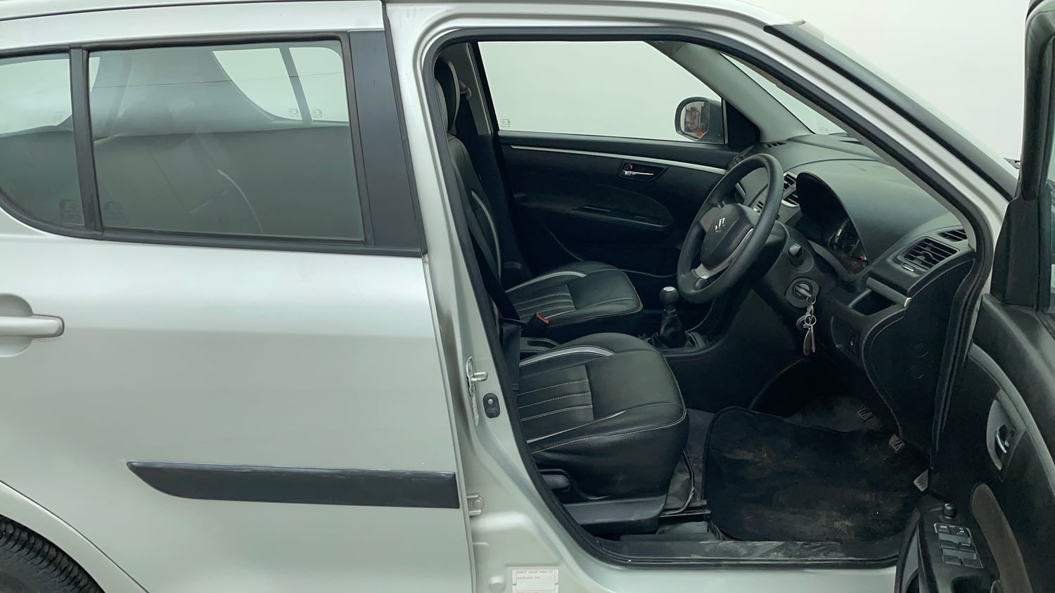 Used 2014 Maruti Suzuki Swift VXi Petrol Manual interior RIGHT SIDE FRONT DOOR CABIN VIEW