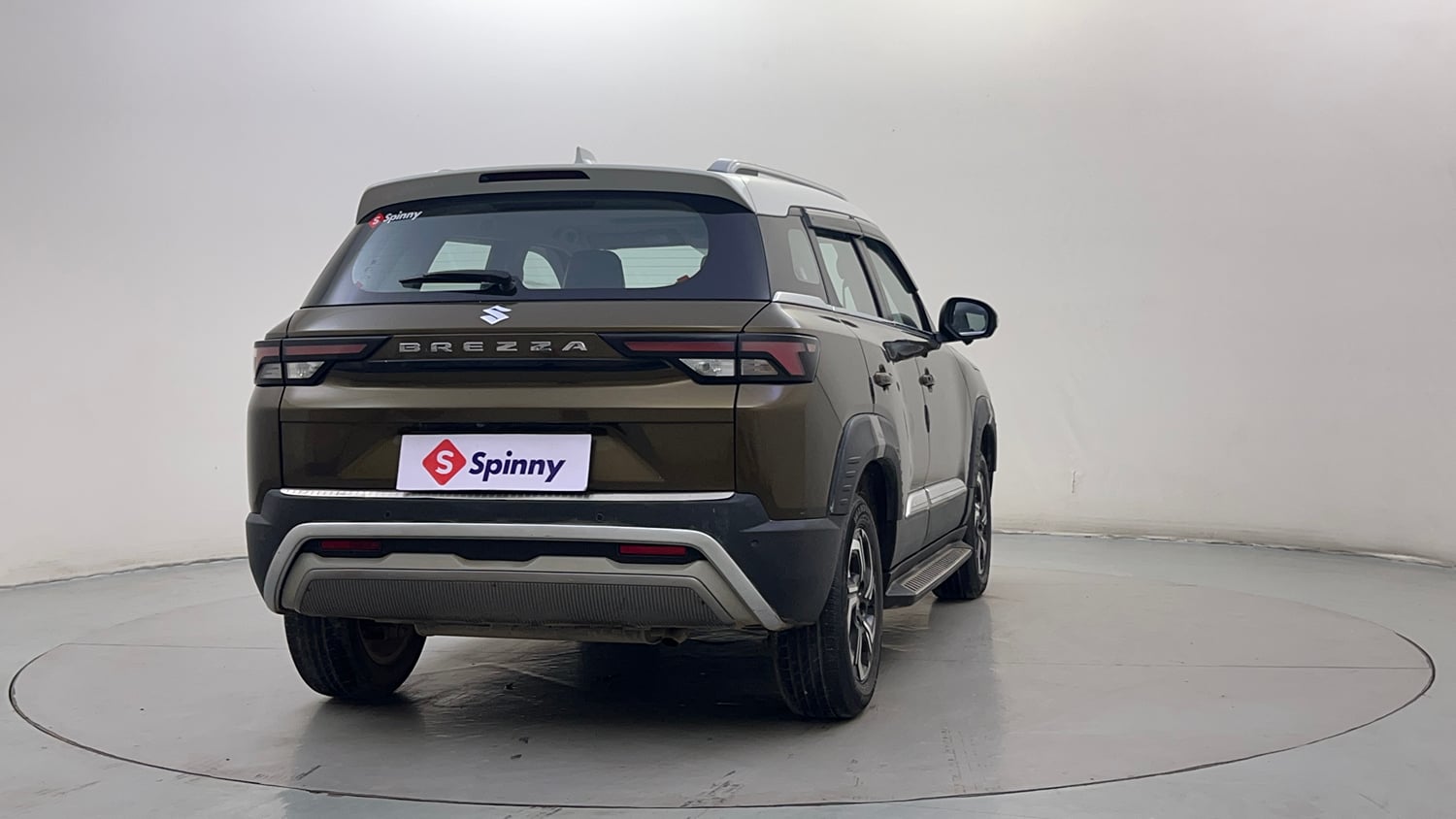 Used 2023 Maruti Suzuki Brezza Zxi Plus Dual Tone Petrol Manual exterior RIGHT REAR CORNER VIEW