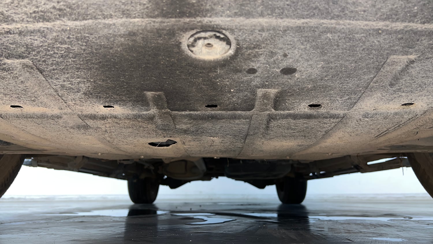 Used 2024 Mahindra XUV700 AX 7 Luxury Pack Petrol AT 7 STR Petrol Automatic extra FRONT LEFT UNDERBODY VIEW