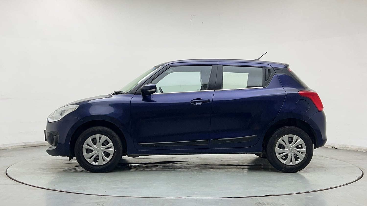 Used 2022 Maruti Suzuki Swift VXi Petrol Manual exterior LEFT SIDE VIEW