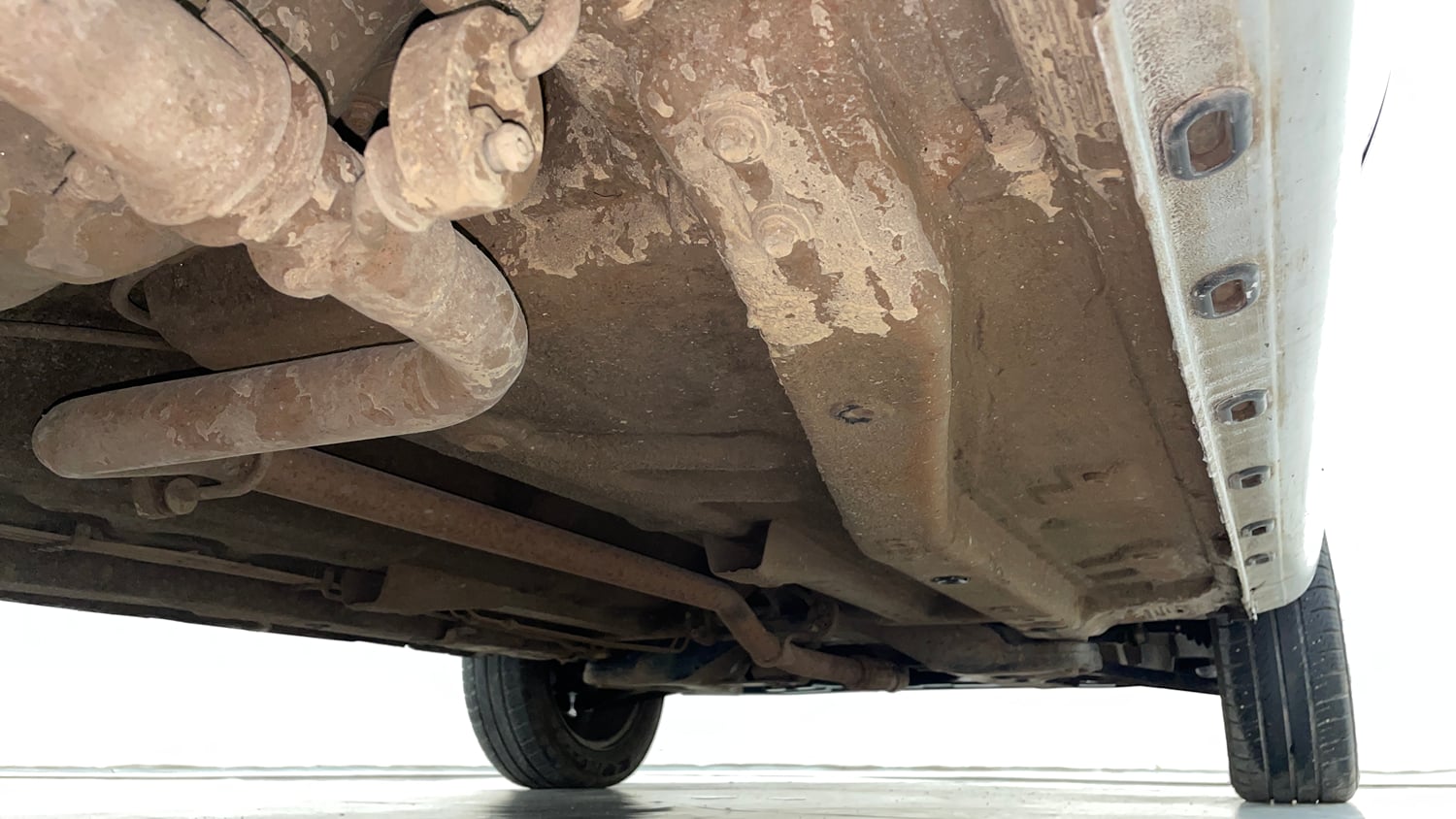 Used 2015 Tata Zest XM Petrol Petrol Manual extra REAR RIGHT UNDERBODY VIEW