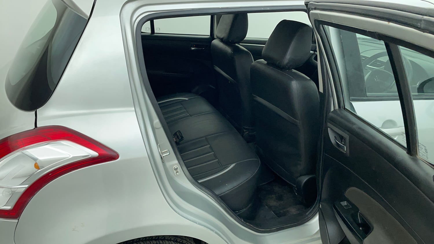 Used 2014 Maruti Suzuki Swift VXi Petrol Manual interior RIGHT SIDE REAR DOOR CABIN VIEW