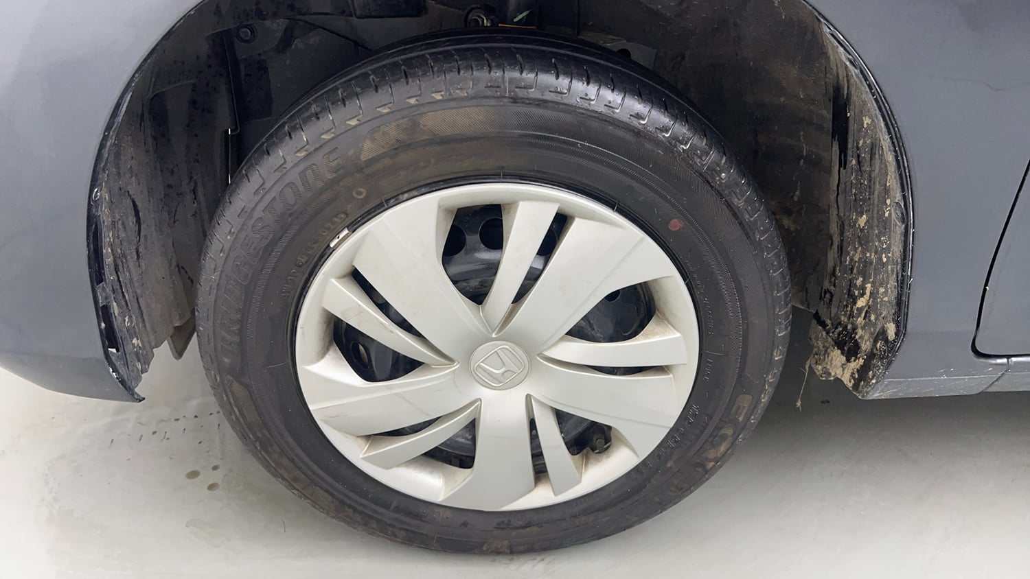 Used 2022 Honda Amaze S MT 1.2 Petrol Petrol Manual tyres LEFT FRONT TYRE RIM VIEW