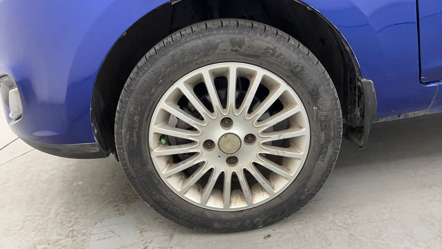 Used 2014 Tata Zest XM Petrol Petrol Manual tyres LEFT FRONT TYRE RIM VIEW