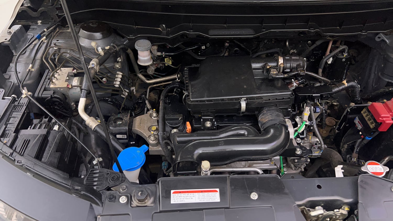 Used 2023 Maruti Suzuki Brezza Zxi Plus Dual Tone Petrol Manual engine ENGINE RIGHT SIDE VIEW
