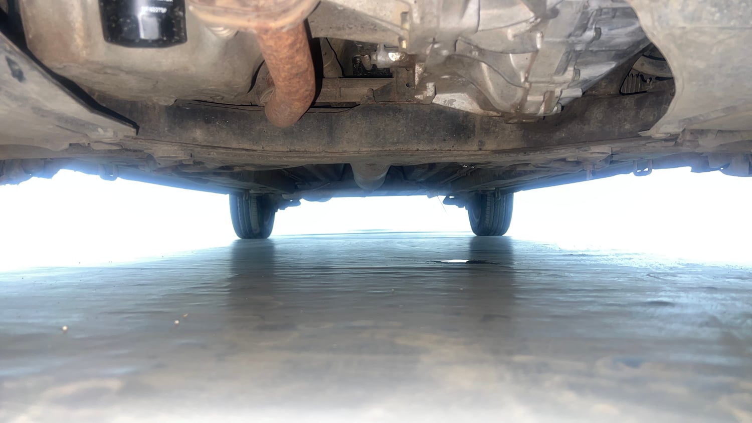 Used 2016 Maruti Suzuki Ertiga ZXI+ Petrol Manual extra FRONT LEFT UNDERBODY VIEW