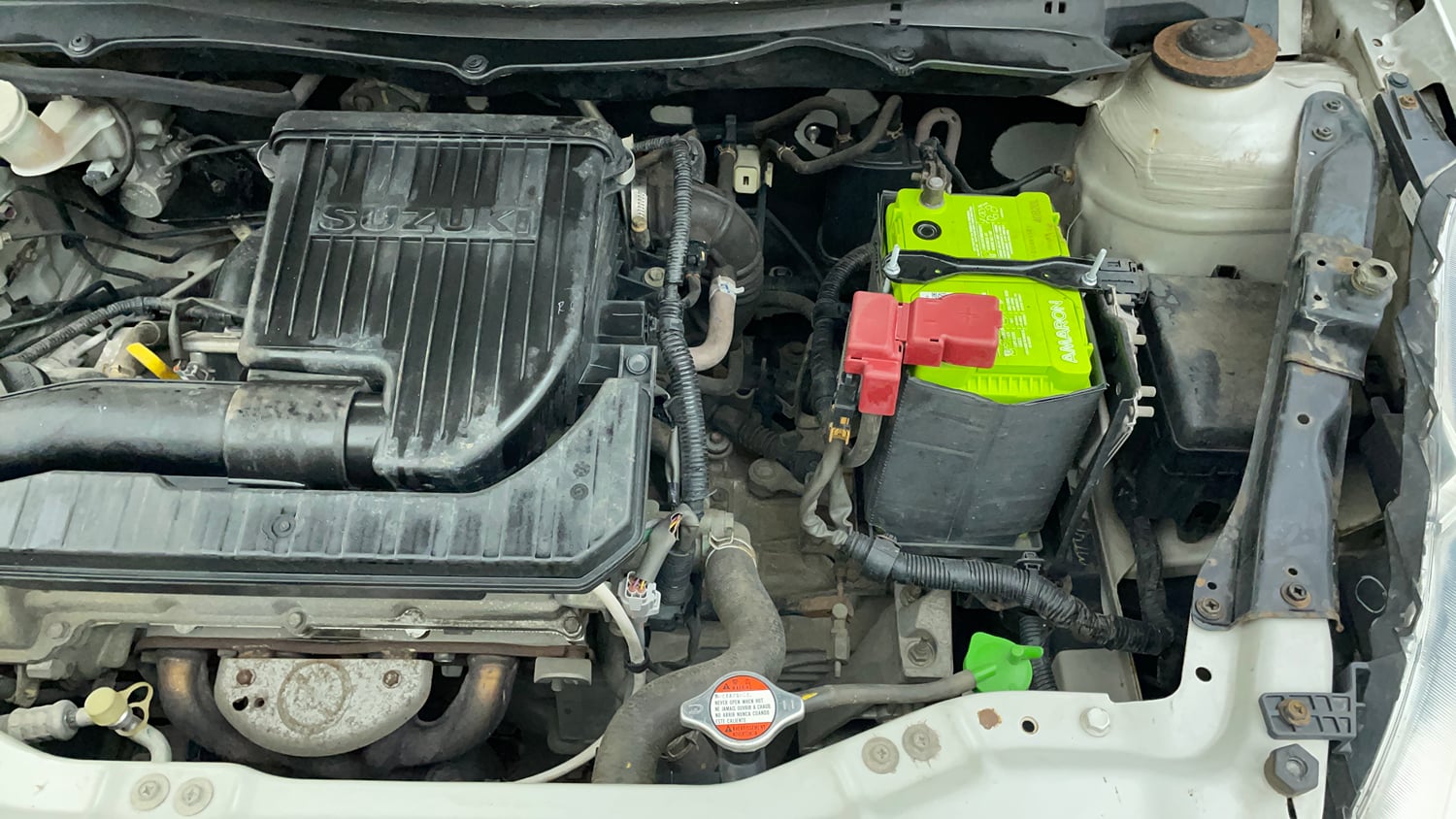 Used 2014 Maruti Suzuki Swift VXi Petrol Manual engine ENGINE LEFT SIDE VIEW