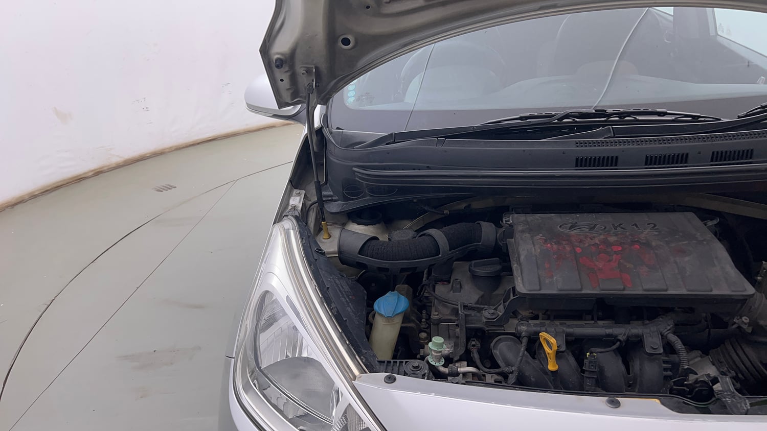 Used 2013 Hyundai Grand i10 Sportz 1.2 Kappa VTVT Petrol Manual engine ENGINE RIGHT SIDE HINGE & APRON VIEW