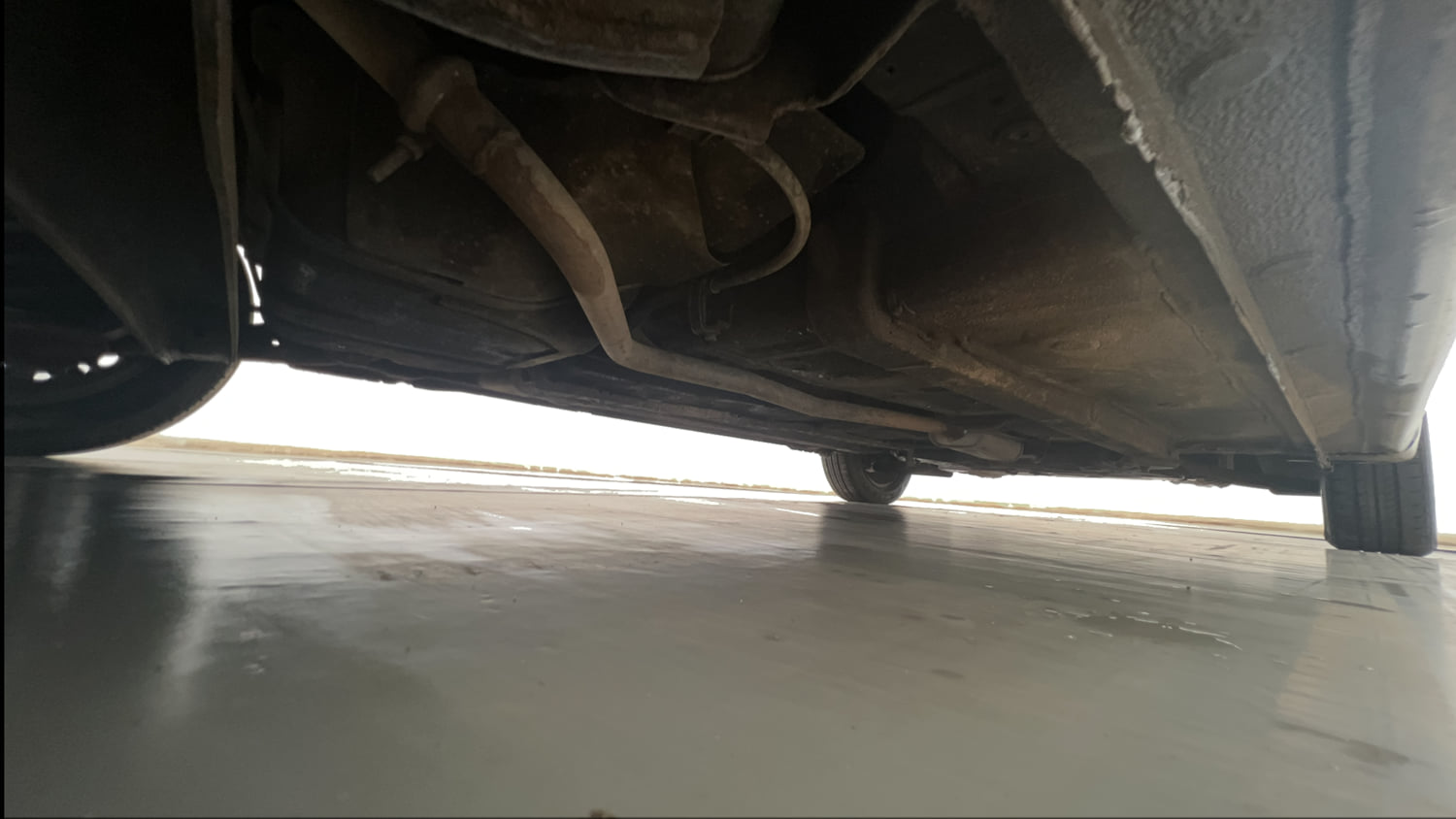 Used 2013 Hyundai Grand i10 Sportz 1.2 Kappa VTVT Petrol Manual extra REAR RIGHT UNDERBODY VIEW
