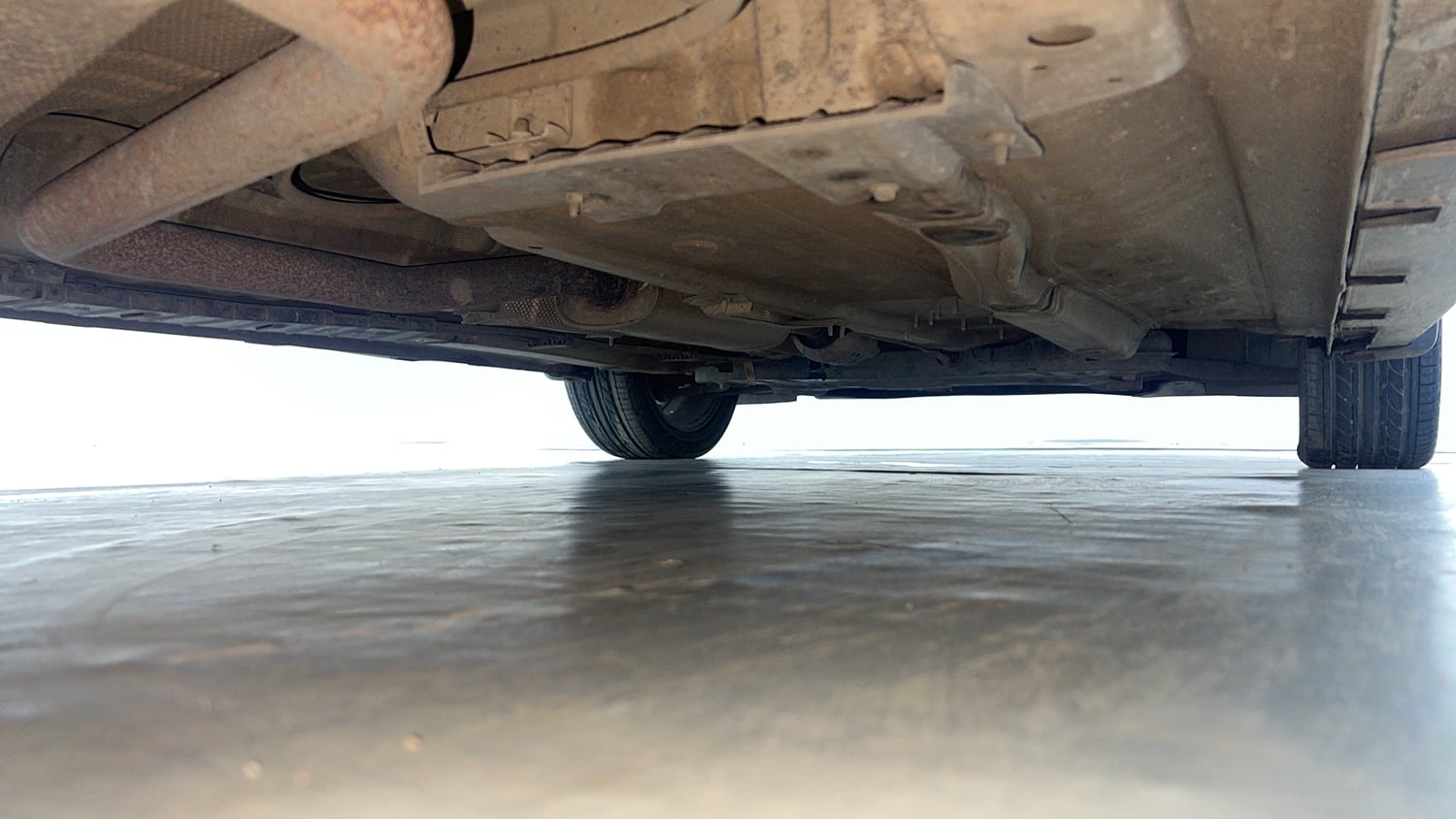 Used 2021 Hyundai New i20 Asta (O) 1.0 Turbo DCT Petrol Automatic extra REAR RIGHT UNDERBODY VIEW