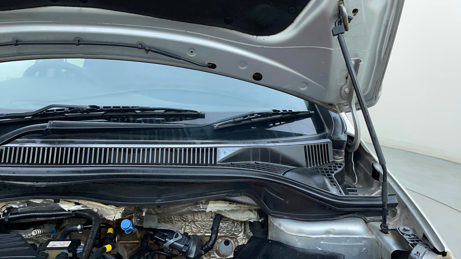 Used 2015 Tata Zest XM Petrol Petrol Manual engine ENGINE LEFT SIDE HINGE & APRON VIEW