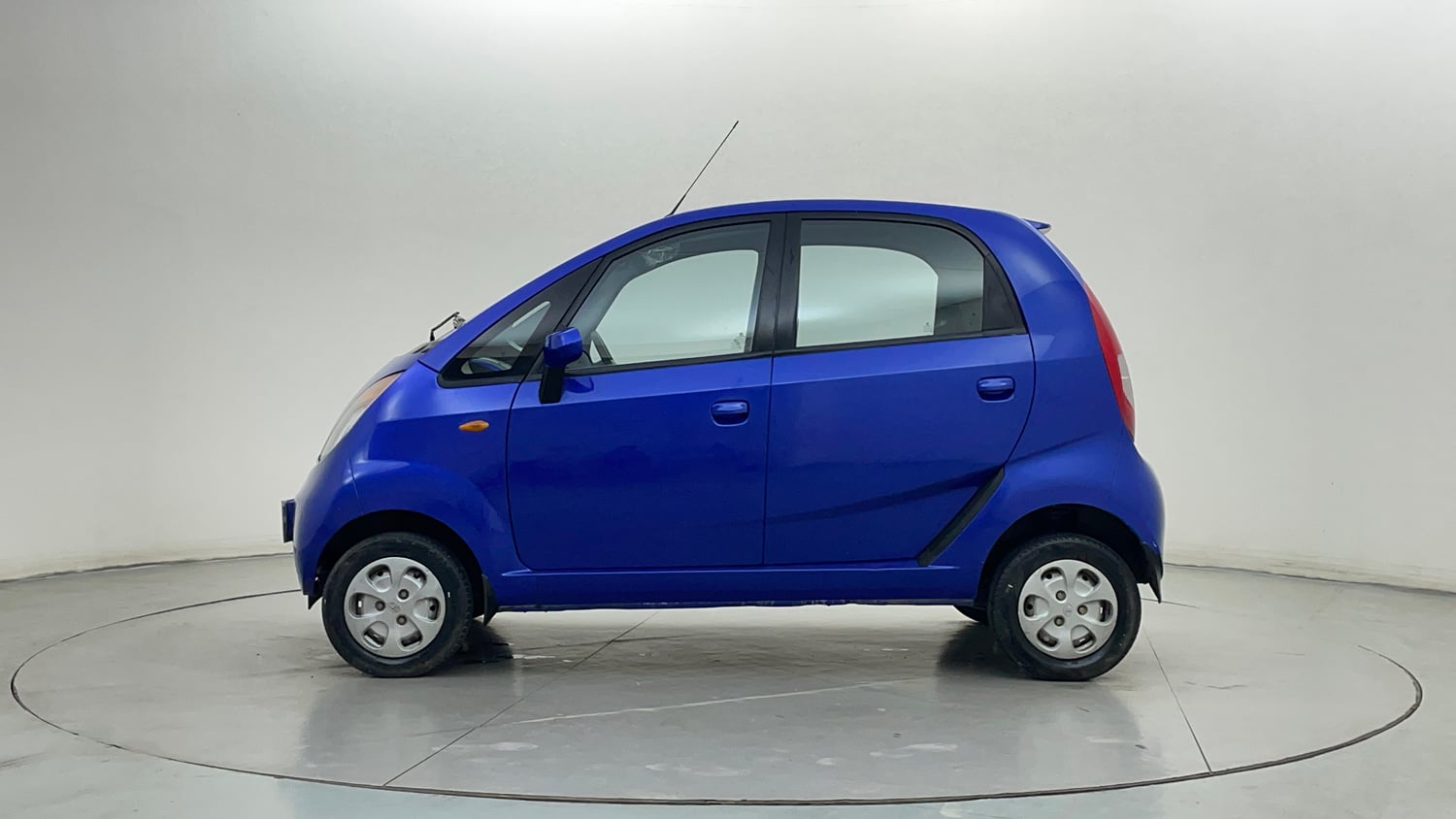 Used 2014 Tata Nano Twist XT Petrol Manual exterior LEFT SIDE VIEW