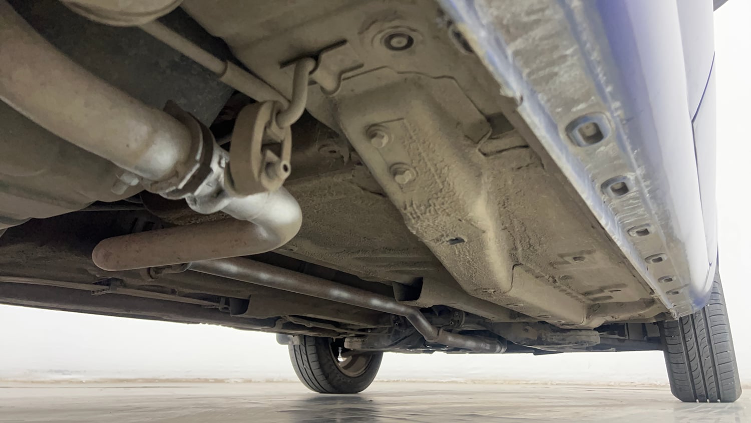 Used 2014 Tata Zest XM Petrol Petrol Manual extra REAR RIGHT UNDERBODY VIEW
