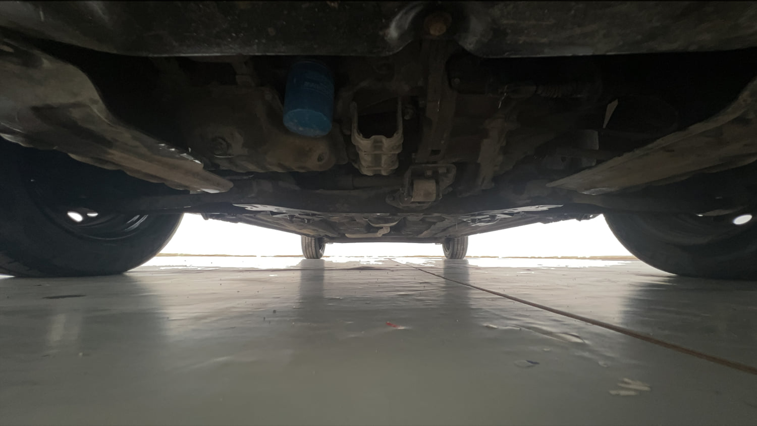 Used 2013 Hyundai Grand i10 Sportz 1.2 Kappa VTVT Petrol Manual extra FRONT LEFT UNDERBODY VIEW