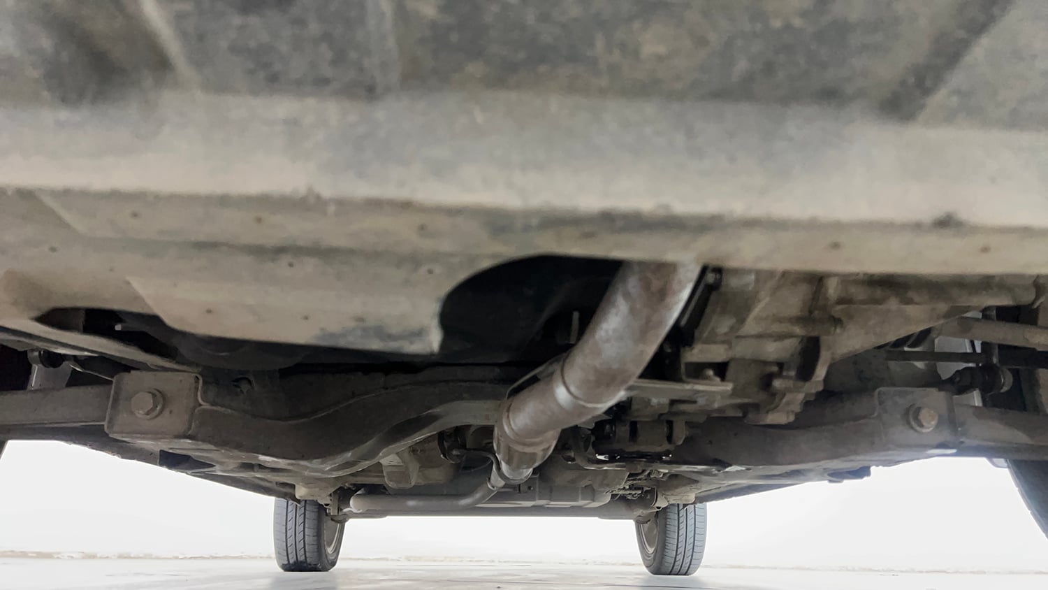 Used 2014 Tata Zest XM Petrol Petrol Manual extra FRONT LEFT UNDERBODY VIEW