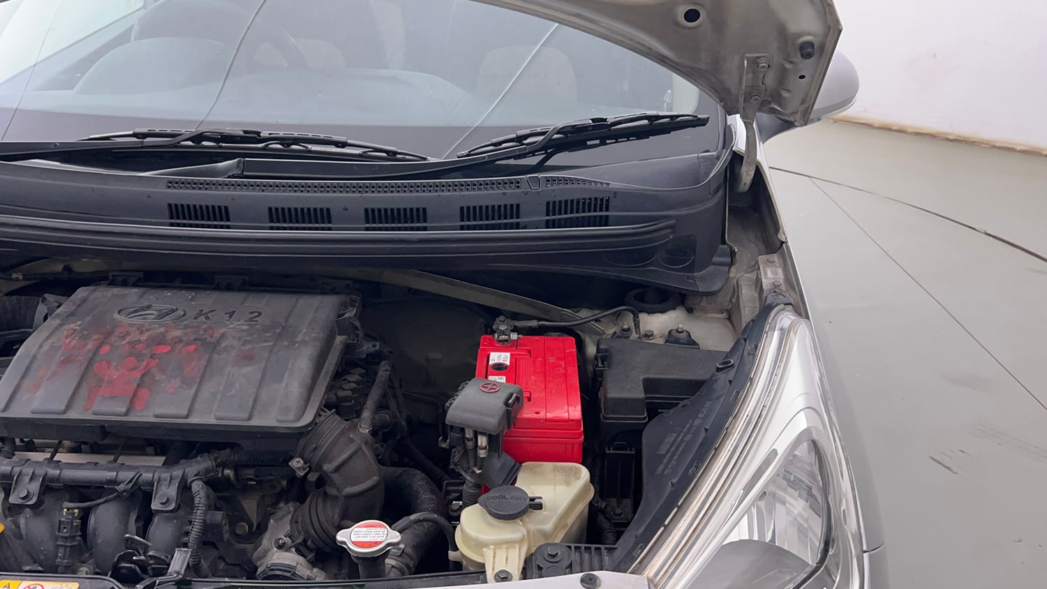 Used 2013 Hyundai Grand i10 Sportz 1.2 Kappa VTVT Petrol Manual engine ENGINE LEFT SIDE HINGE & APRON VIEW
