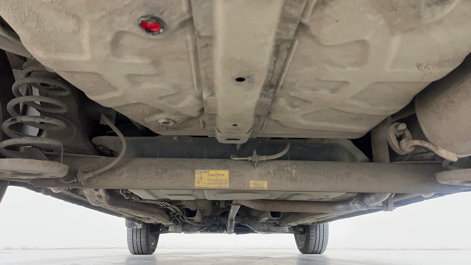 Used 2014 Tata Zest XM Petrol Petrol Manual extra REAR UNDERBODY VIEW (TAKEN FROM REAR)