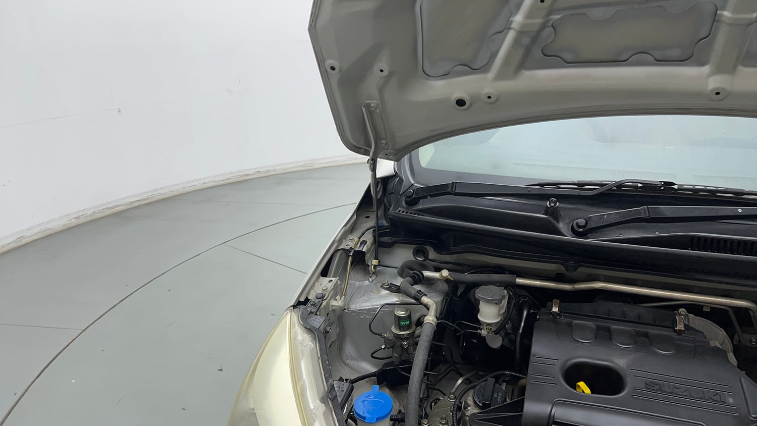 Used 2017 Maruti Suzuki Celerio ZXi AMT Petrol Automatic engine ENGINE RIGHT SIDE HINGE & APRON VIEW