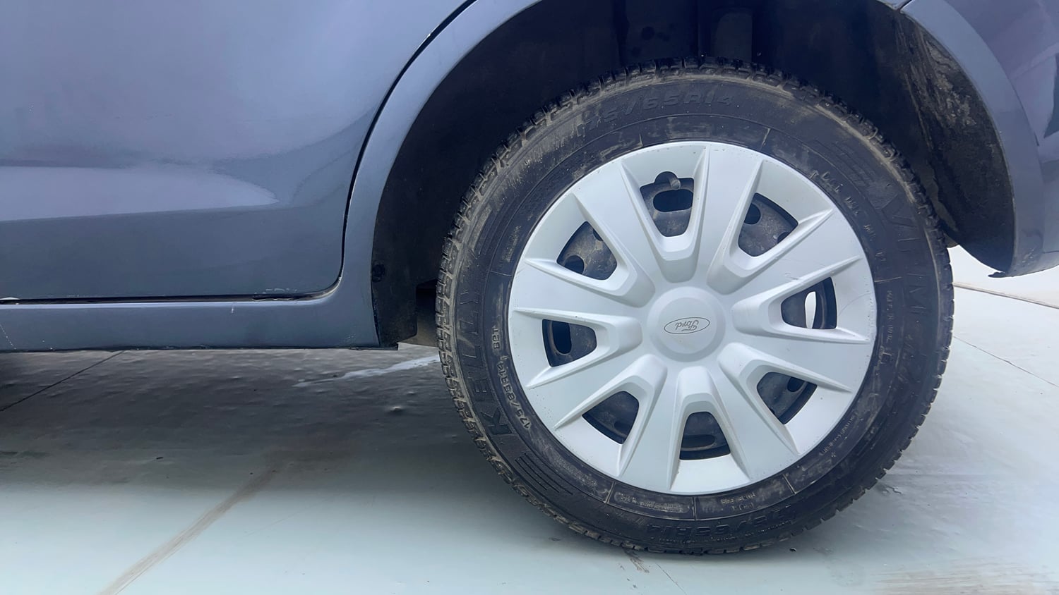 Used 2014 Ford Figo Duratec Petrol ZXI 1.2 Petrol Manual tyres LEFT REAR TYRE RIM VIEW