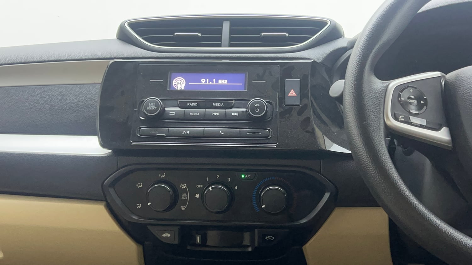 Used 2022 Honda Amaze S MT 1.2 Petrol Petrol Manual top_features Integrated (in-dash) music system