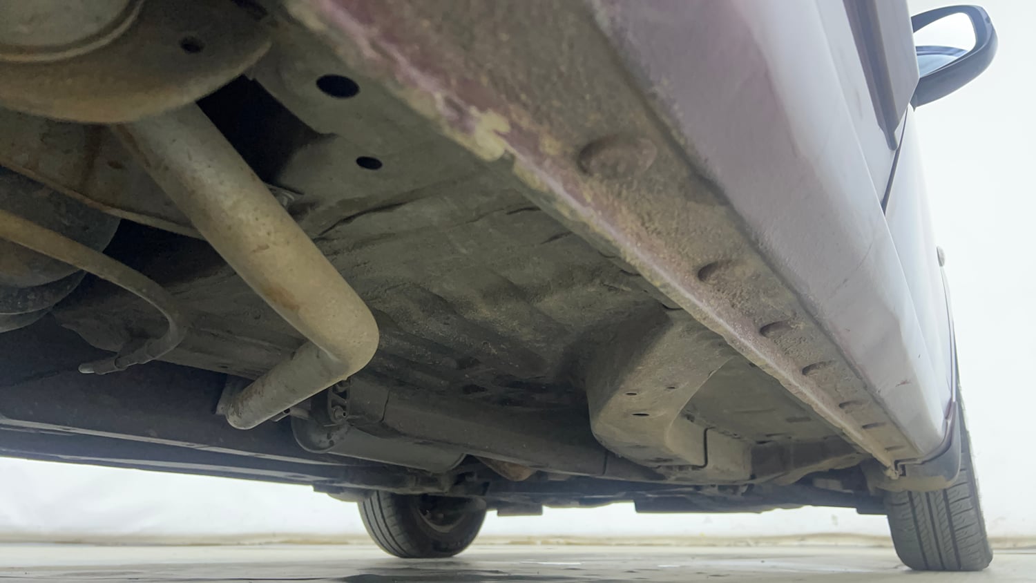 Used 2015 Honda Amaze 1.2 S i-VTEC Petrol Manual extra REAR RIGHT UNDERBODY VIEW