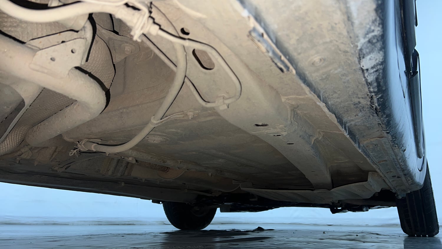 Used 2022 Maruti Suzuki Swift VXi Petrol Manual extra REAR RIGHT UNDERBODY VIEW