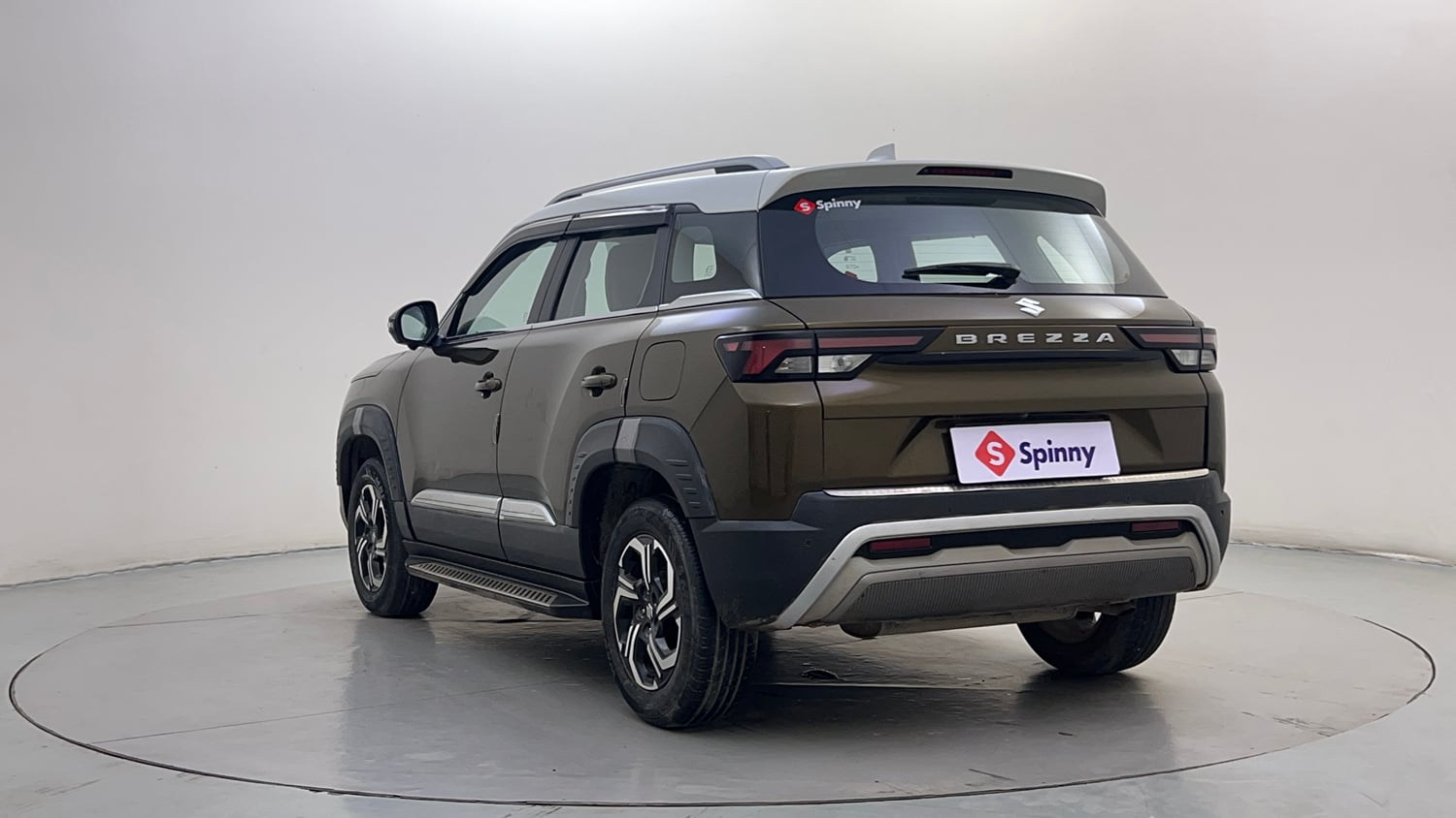 Used 2023 Maruti Suzuki Brezza Zxi Plus Dual Tone Petrol Manual exterior LEFT REAR CORNER VIEW