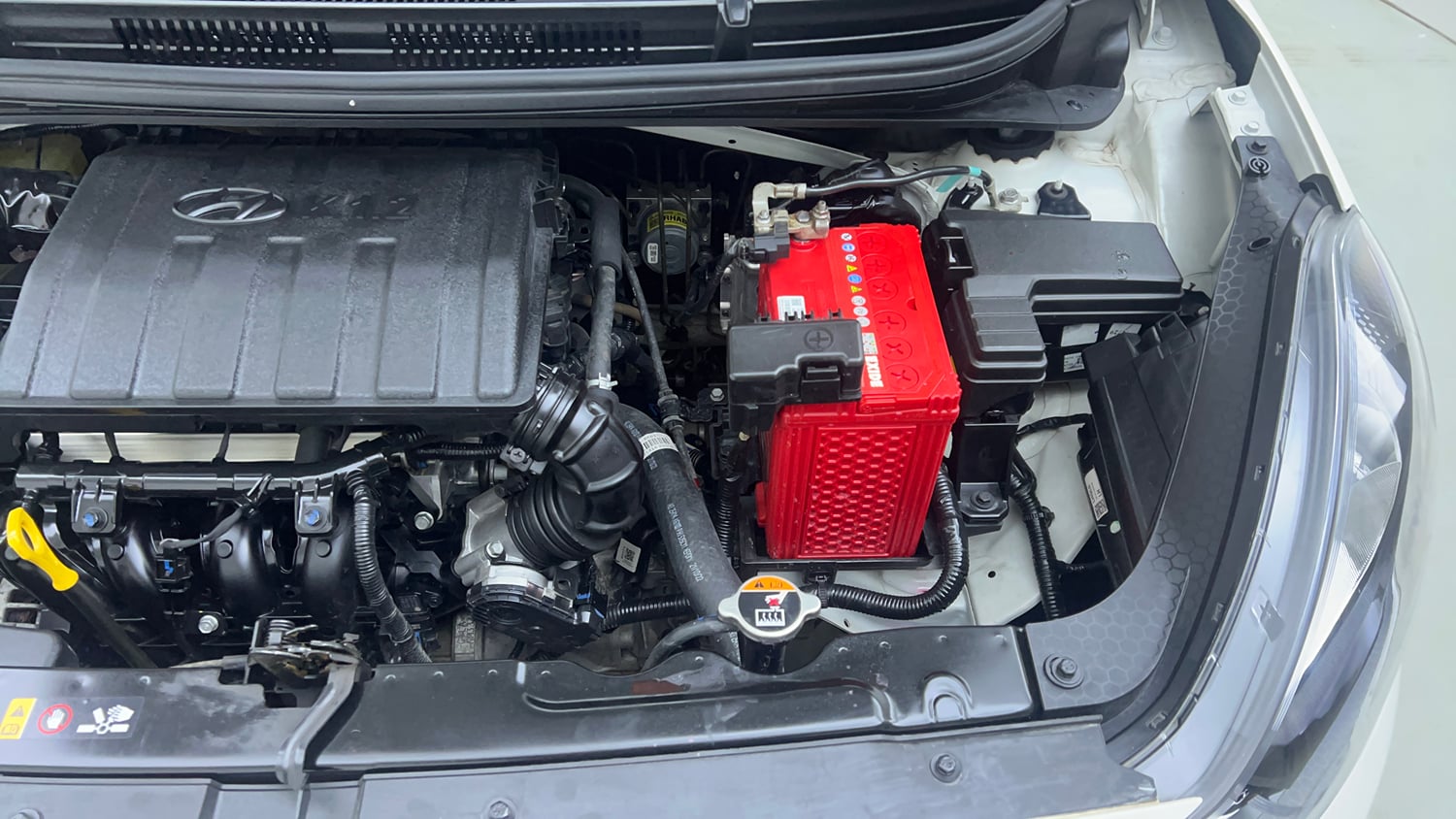 Used 2022 Hyundai Grand i10 Nios Sportz 1.2 Kappa VTVT Petrol Manual engine ENGINE LEFT SIDE VIEW
