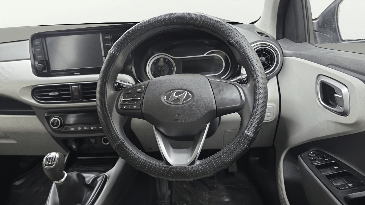 Used 2021 Hyundai Grand i10 Nios Asta 1.2 Kappa VTVT Petrol Manual interior STEERING VIEW
