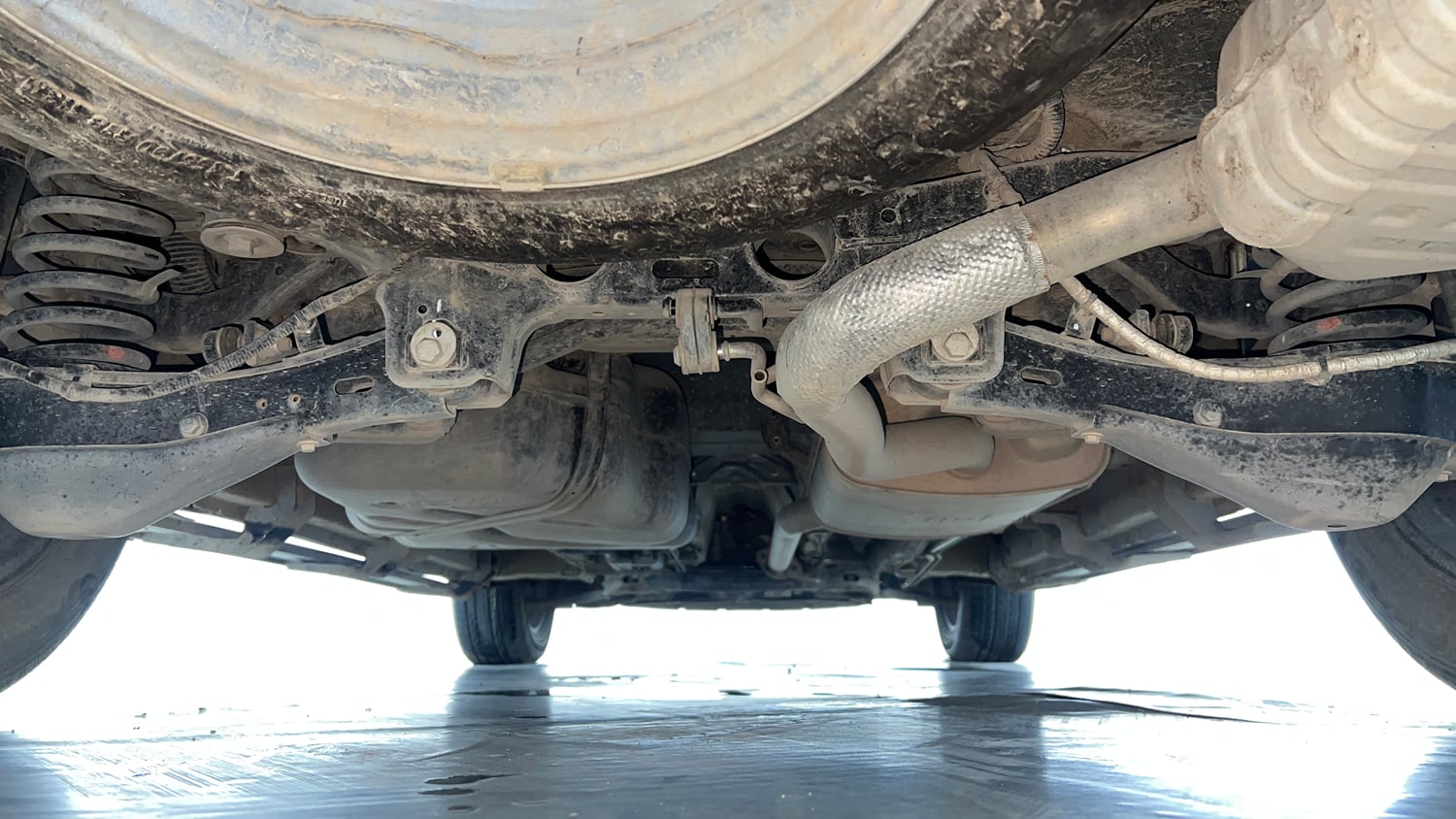 Used 2024 Mahindra XUV700 AX 7 Luxury Pack Petrol AT 7 STR Petrol Automatic extra REAR UNDERBODY VIEW (TAKEN FROM REAR)