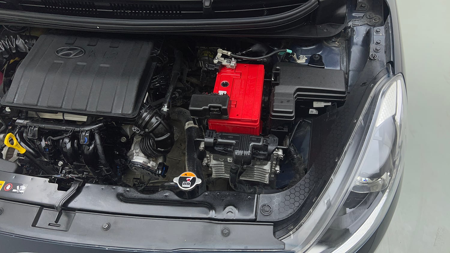 Used 2023 Hyundai Grand i10 Nios Sportz AMT 1.2 Kappa VTVT Petrol Automatic engine ENGINE LEFT SIDE VIEW