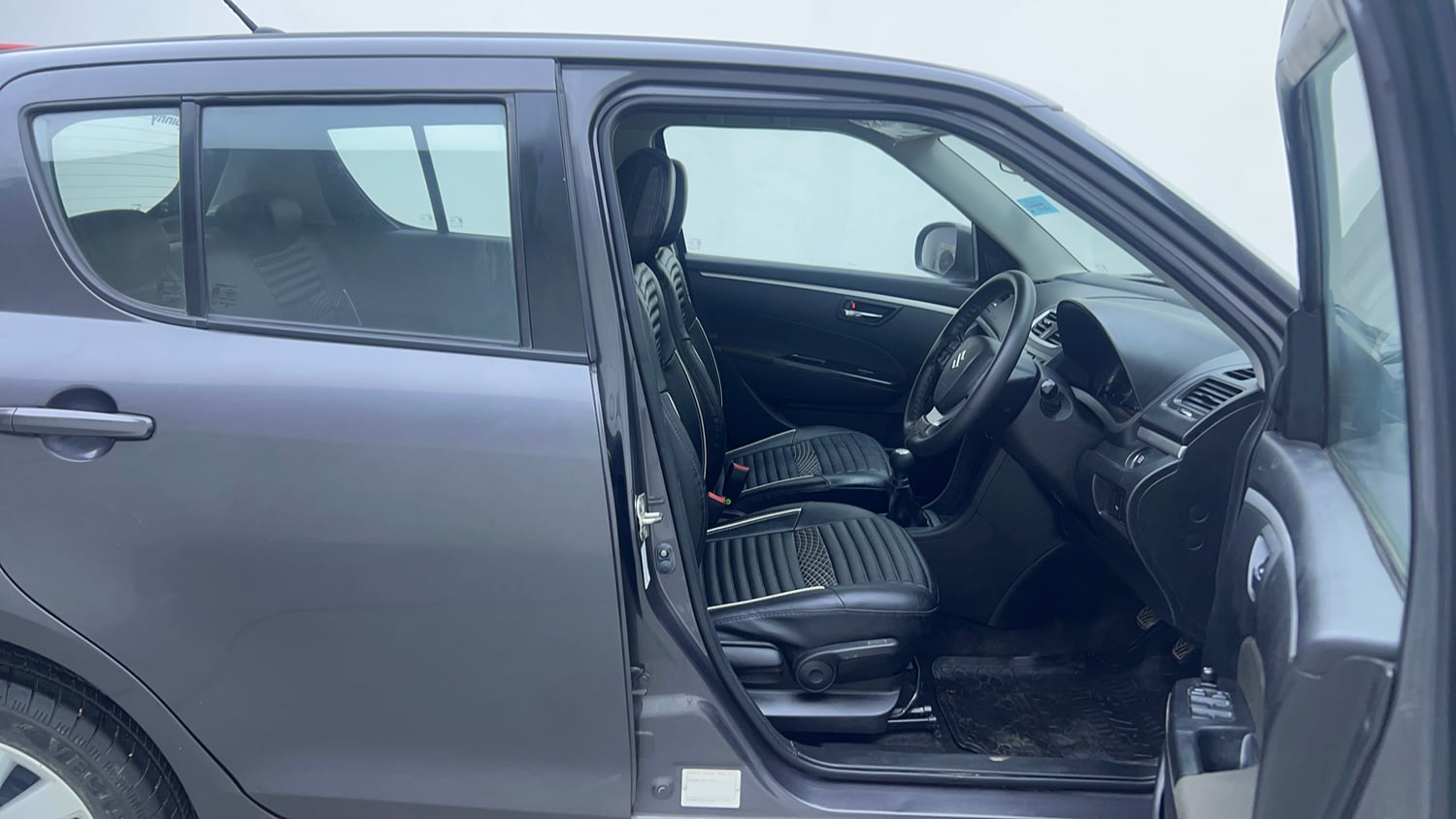 Used 2017 Maruti Suzuki Swift ZXi Petrol Manual interior RIGHT SIDE FRONT DOOR CABIN VIEW