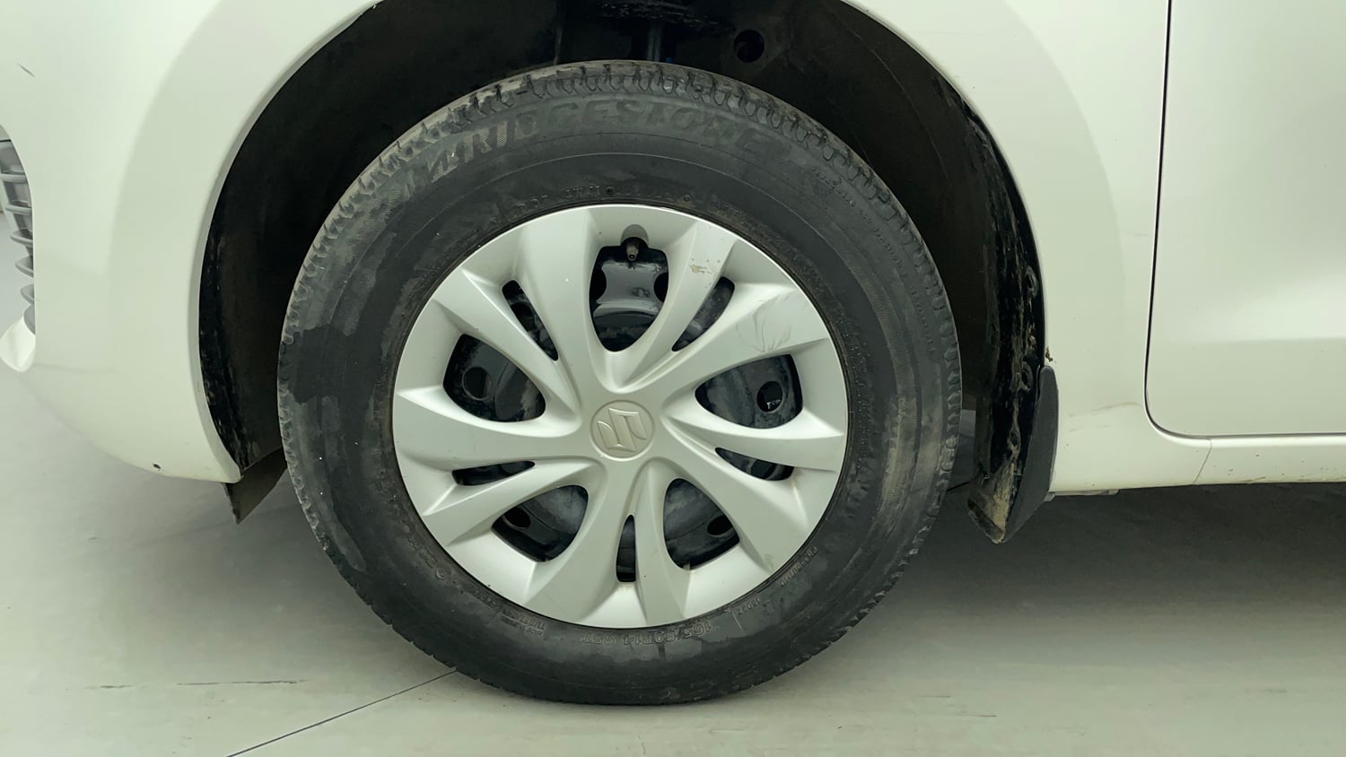 Used 2020 Maruti Suzuki Swift VXi AMT Petrol Automatic tyres LEFT FRONT TYRE RIM VIEW