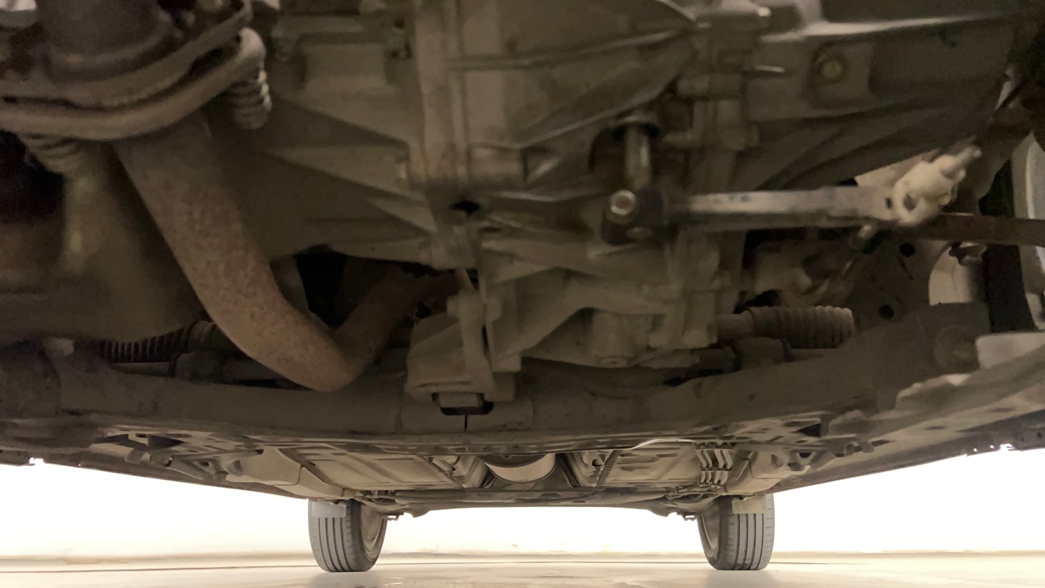 Used 2021 Toyota Glanza G Petrol Manual extra FRONT LEFT UNDERBODY VIEW