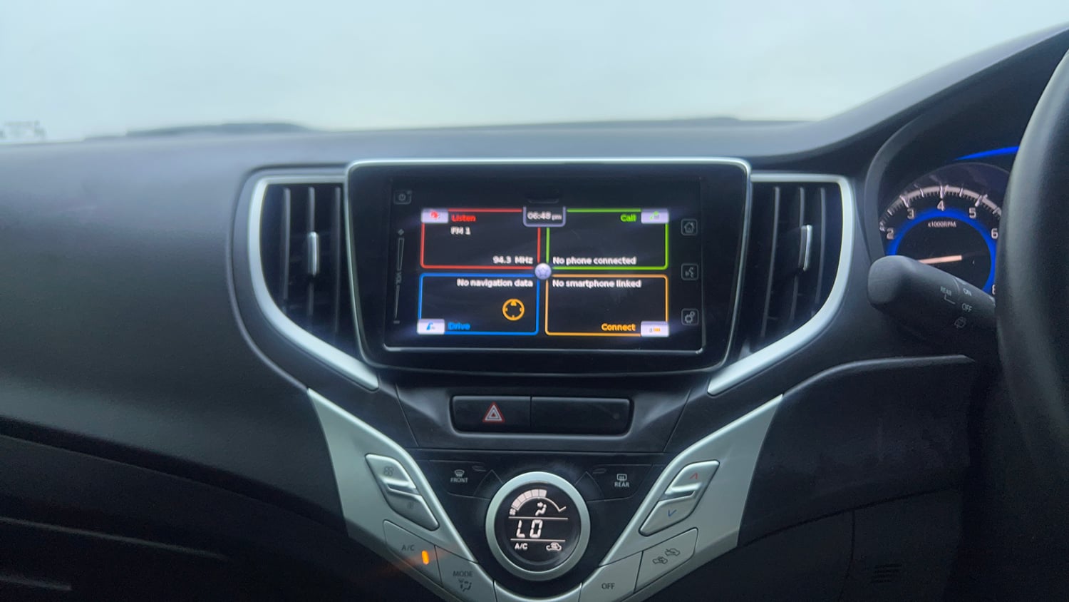 Used 2018 Maruti Suzuki Baleno Alpha 1.2 Petrol Manual top_features Integrated (in-dash) music system