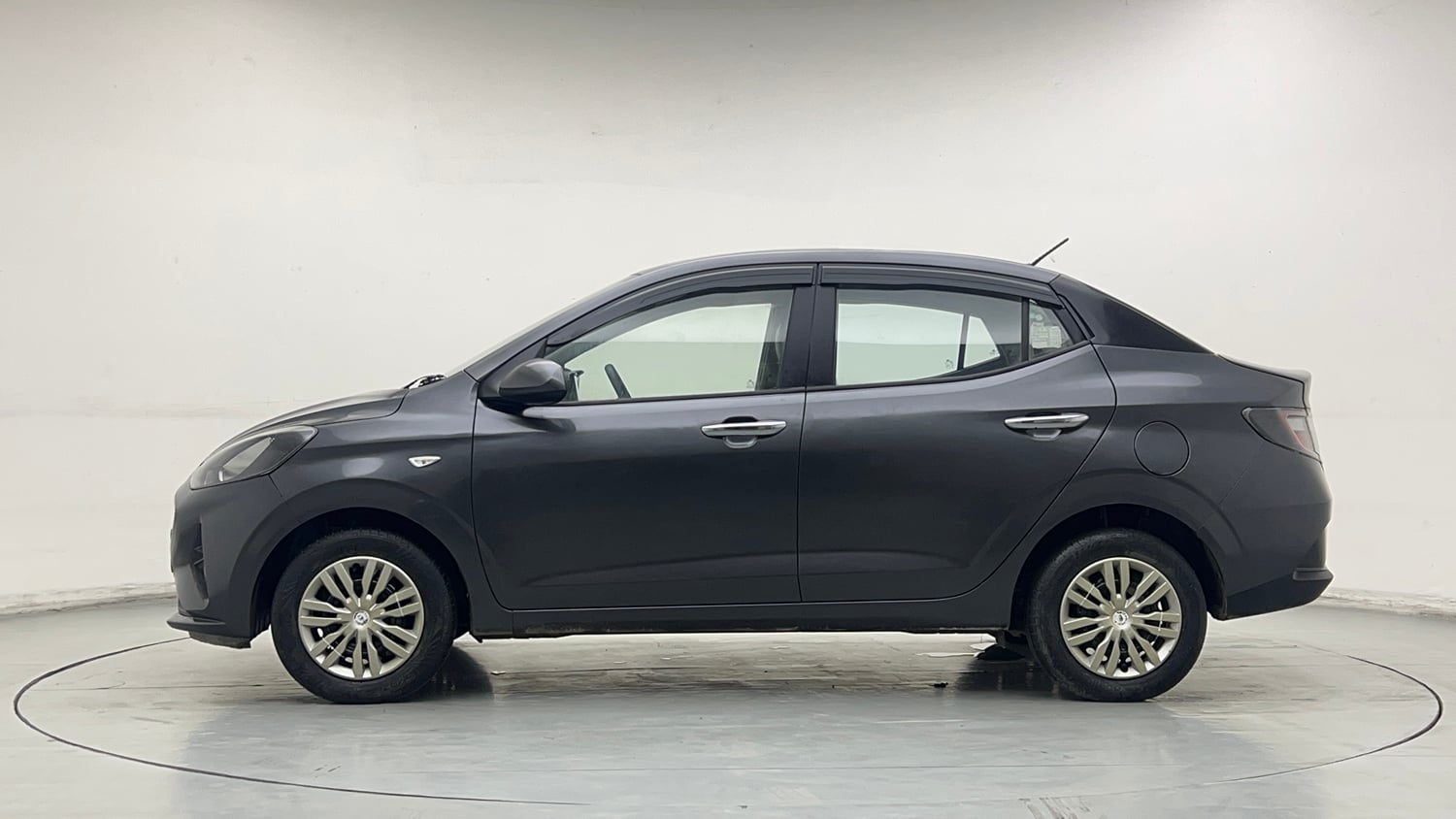 Used 2022 Hyundai Aura S 1.2 CNG Cng Manual exterior LEFT SIDE VIEW