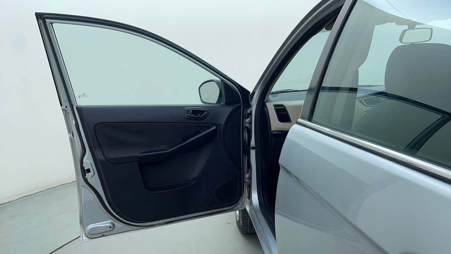 Used 2015 Tata Zest XM Petrol Petrol Manual interior LEFT FRONT DOOR OPEN VIEW