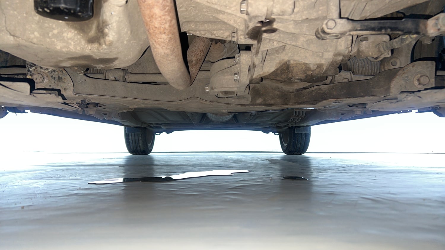 Used 2021 Maruti Suzuki Baleno Zeta Petrol Manual extra FRONT LEFT UNDERBODY VIEW