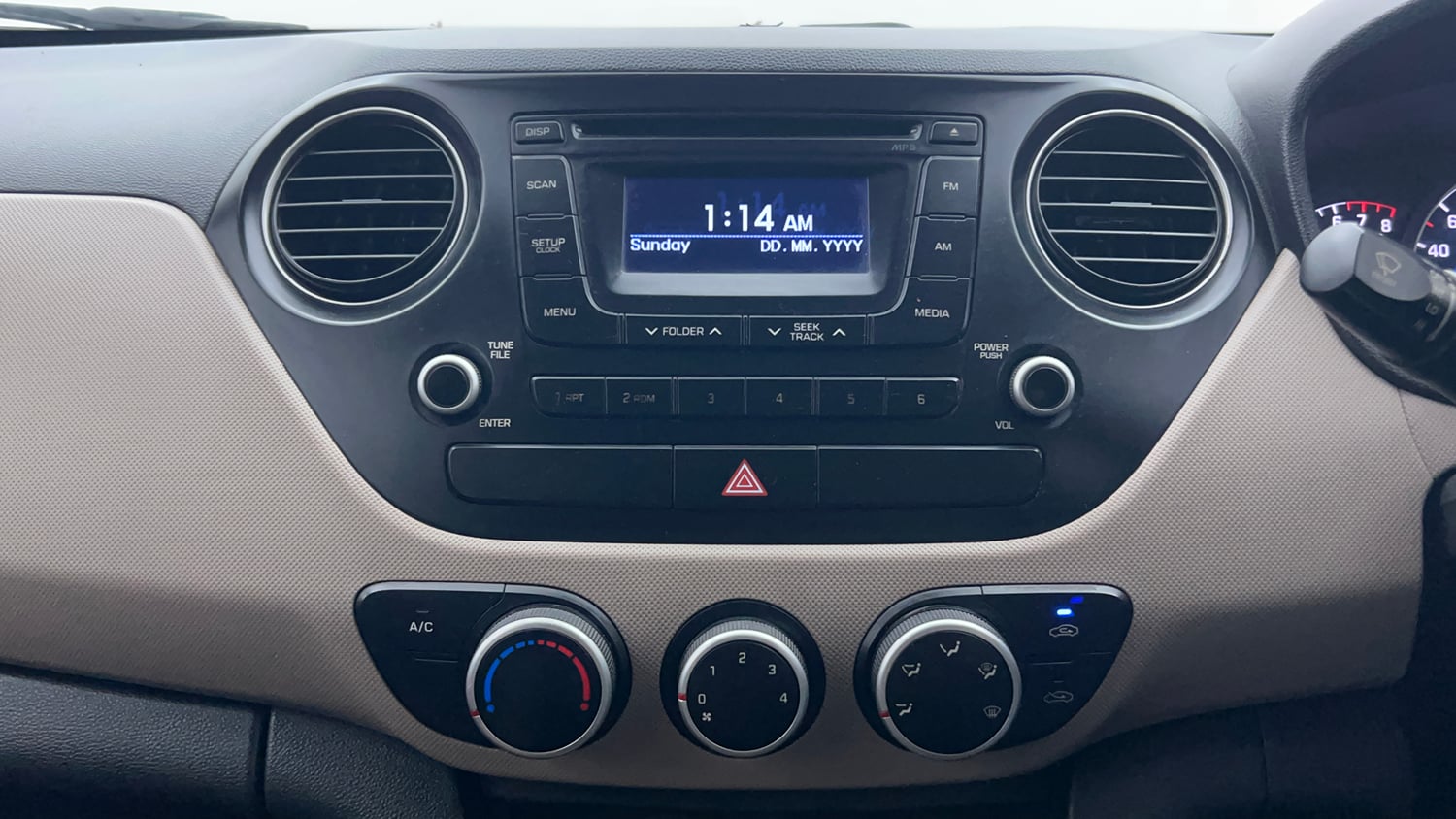 Used 2013 Hyundai Grand i10 Sportz 1.2 Kappa VTVT Petrol Manual interior MUSIC SYSTEM & AC CONTROL VIEW