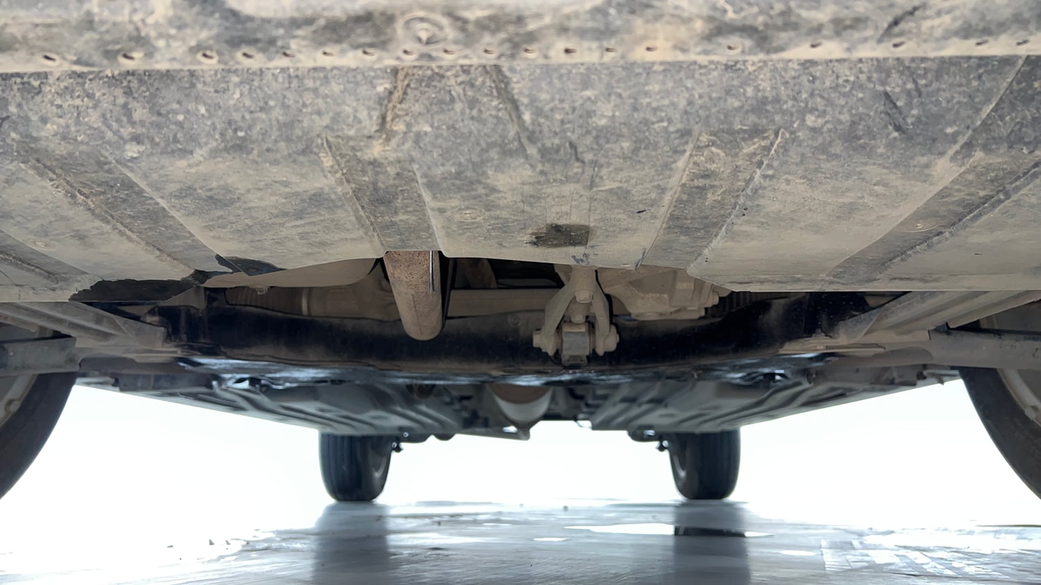 Used 2024 Maruti Suzuki Grand Vitara Zeta Smart Hybrid Petrol Manual extra FRONT LEFT UNDERBODY VIEW