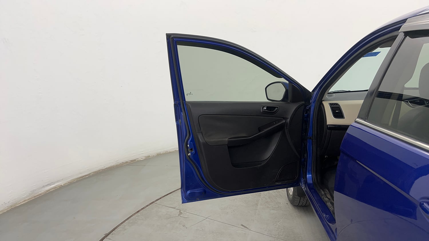 Used 2014 Tata Zest XM Petrol Petrol Manual interior LEFT FRONT DOOR OPEN VIEW