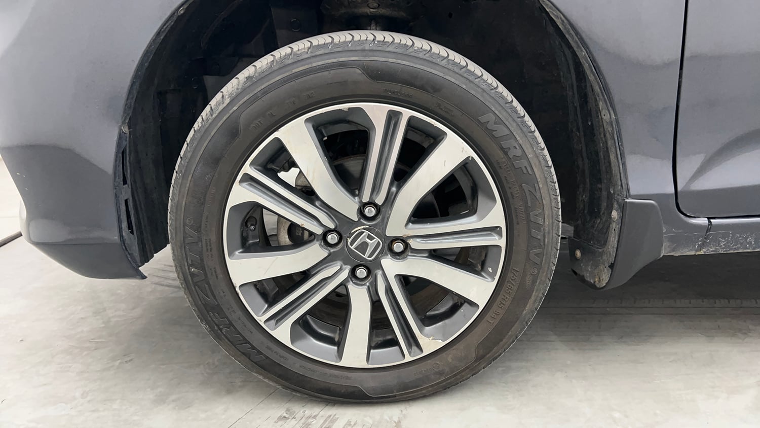 Used 2025 honda Amaze 2nd Generation VX 1.2 Petrol MT Petrol Manual tyres LEFT FRONT TYRE RIM VIEW