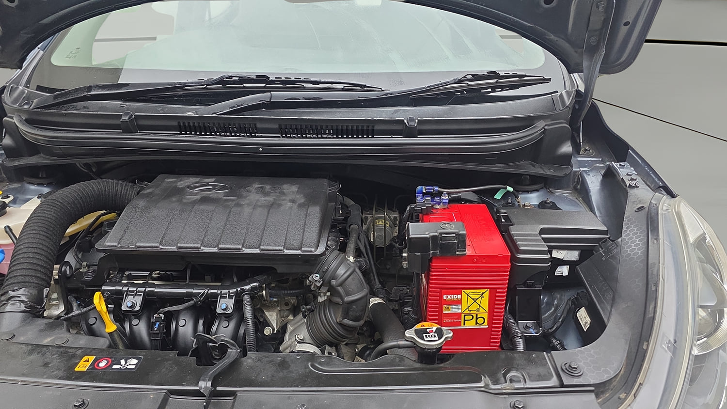 Used 2021 Hyundai Grand i10 Nios Asta 1.2 Kappa VTVT Petrol Manual engine ENGINE LEFT SIDE HINGE & APRON VIEW