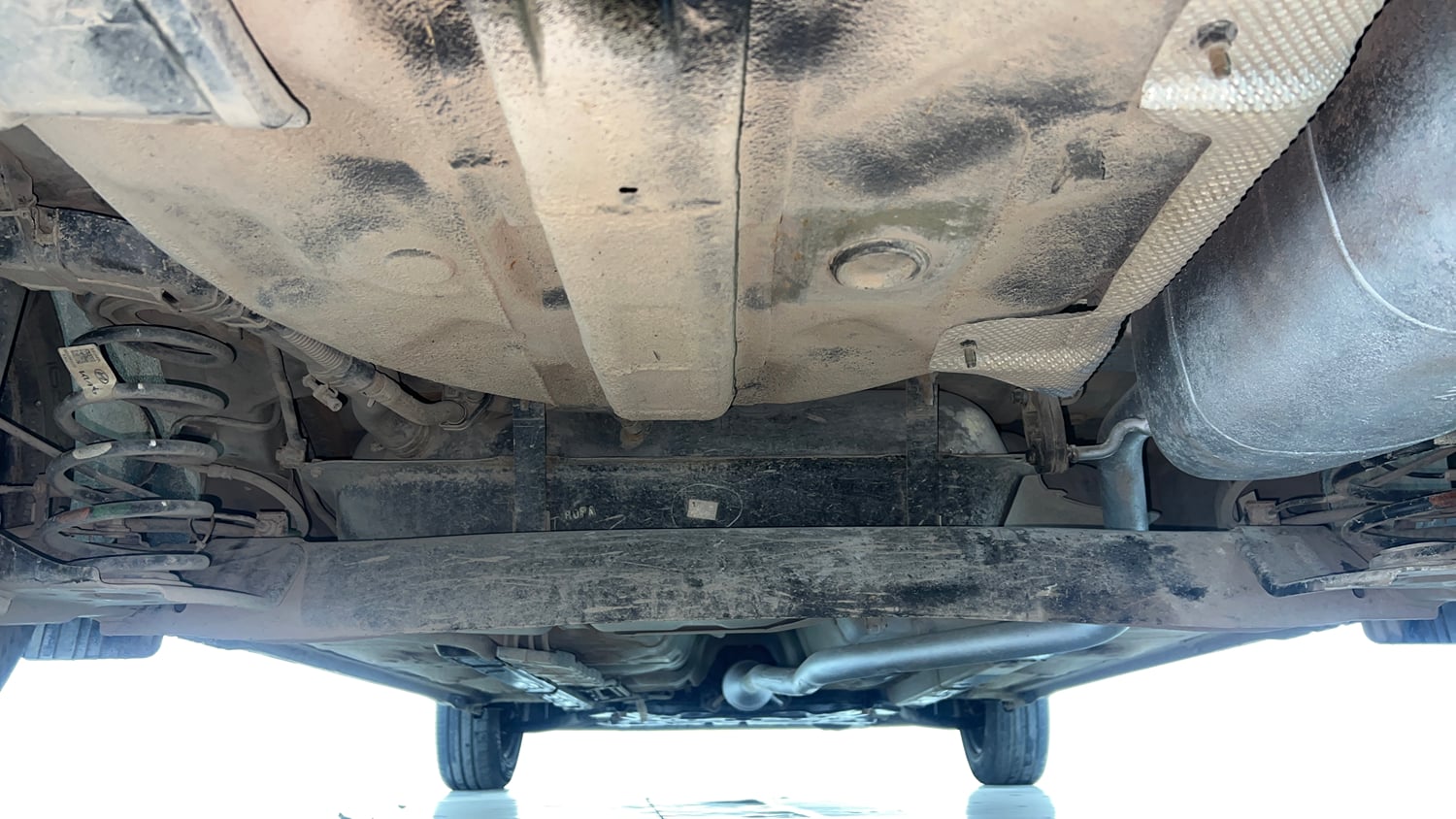 Used 2022 Hyundai Aura S 1.2 CNG Cng Manual extra REAR UNDERBODY VIEW (TAKEN FROM REAR)