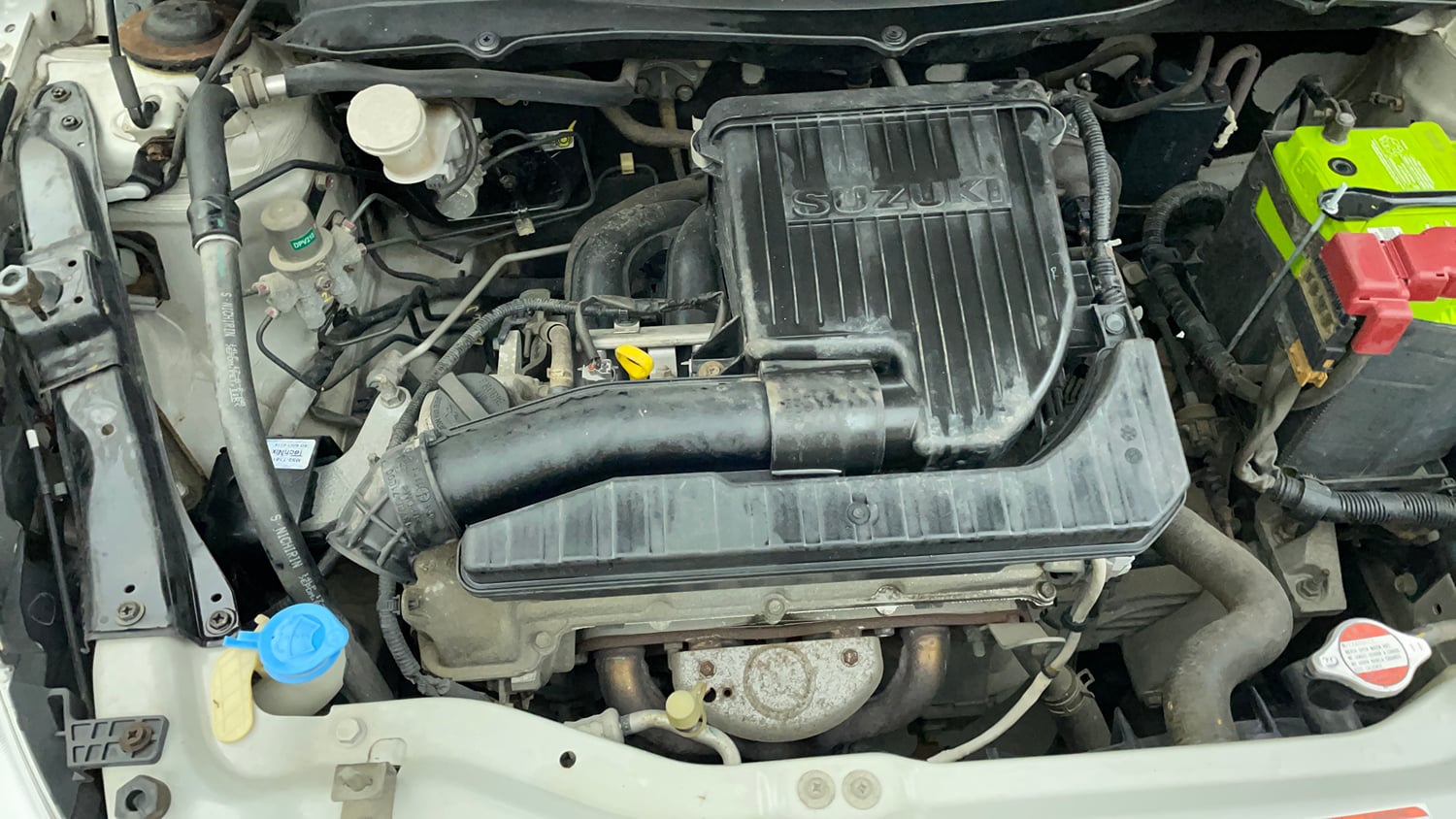 Used 2014 Maruti Suzuki Swift VXi Petrol Manual engine ENGINE RIGHT SIDE VIEW